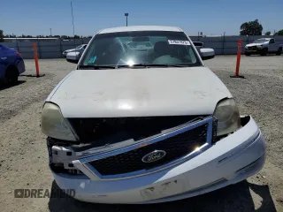 2005 Ford Five Hundred SE z VIN 1FAFP231X5G166052, wystawiony jako Copart lot #57831975 z przebiegiem 90 036 mil mil oraz Tytuł czysty. Historia ofert i sprzedaży dostępna na DreamBid. Obrazek 5.