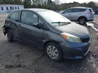 2012 Toyota Yaris L with VIN JTDJTUD32CD517983, listed as a IAAI auction lot 41581429 with 77,261 mi miles. Bid and sale history available at carsss.com. Image 1.