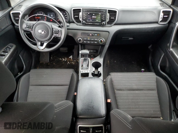 2018 Kia Sportage LX z VIN KNDPMCAC9J7318589, wystawiony jako Copart lot #59397595 z przebiegiem 107 523 mil mil oraz Szkoda całkowita • Salvage title. Historia ofert i sprzedaży dostępna na DreamBid. Obrazek 8.