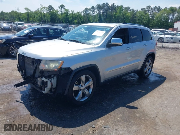 2011 Jeep Grand Cherokee Overland with VIN 1J4RR6GGXBC526649, listed as a IAAI auction lot 42162327 with 185,129 mi miles and . Bid and sale history available at DreamBid. Image 2.