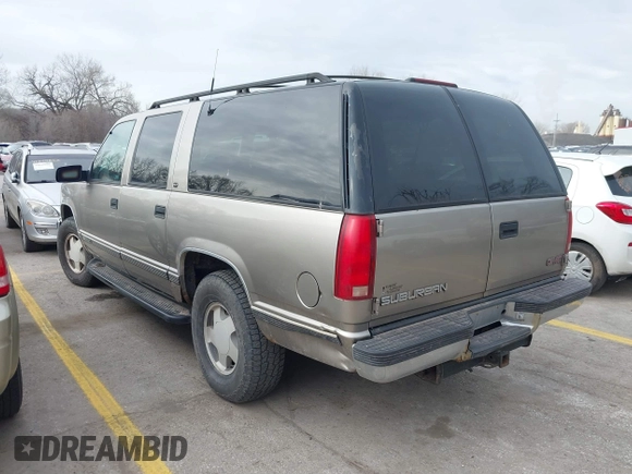 1998 GMC Suburban z VIN 3GKFK16R1WG510379, wystawiony jako IAAI lot #41859604 z przebiegiem 300 493 mil mil oraz . Historia ofert i sprzedaży dostępna na DreamBid. Obrazek 3.