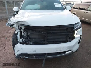 2021 Chevrolet Tahoe LT with VIN 1GNSCNKD9MR173604, listed as a IAAI auction lot 41036568 with 95,962 mi miles. Bid and sale history available at carsss.com. Image 6.