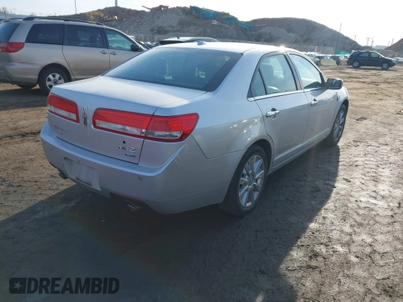 2012 Lincoln MKZ with VIN 3LNHL2JCXCR825669, listed as a IAAI auction lot 41649589 with 183,446 mi miles. Bid and sale history available at carsss.com. Image 4.