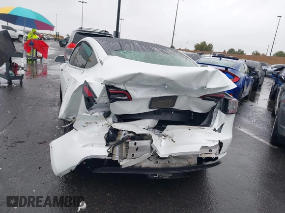 2020 Tesla Model 3 Standard Range Plus with VIN 5YJ3E1EA2LF740225, listed as a IAAI auction lot 41781554 with 46,703 mi miles. Bid and sale history available at carsss.com. Image 6.