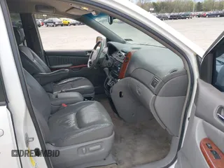 2005 Toyota Sienna XLE with VIN 5TDBA22C35S034074, listed as a IAAI auction lot 42087561 with 108,608 mi miles. Bid and sale history available at carsss.com. Image 5.
