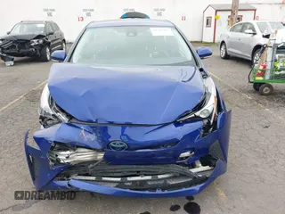 2018 Toyota Prius Two with VIN JTDKBRFU8J3067821, listed as a IAAI auction lot 41767013 with 82,285 mi miles and . Bid and sale history available at carsss.com. Image 6.
