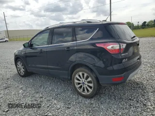 2017 Ford Escape Titanium with VIN 1FMCU0JD5HUB95239, listed as a Copart auction lot 55458405 with 106,193 mi miles and Clean Title. Bid and sale history available at carsss.com. Image 2.