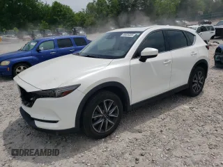 2018 Mazda CX-5 Grand Touring with VIN JM3KFBDMXJ0473770, listed as a Copart auction lot 56635825 with 70,510 mi miles and Salvage title. Bid and sale history available at DreamBid. Image 1.