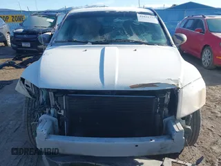 2011 Dodge Caliber Heat with VIN 1B3CB5HA5BD249182, listed as a IAAI auction lot 41831735 with 98,491 mi miles and . Bid and sale history available at DreamBid. Image 13.