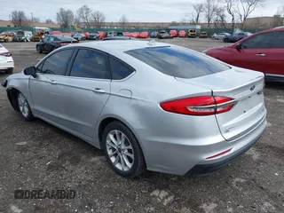 2019 Ford Fusion Hybrid SE with VIN 3FA6P0LU9KR104886, listed as a IAAI auction lot 41742835 with 1 mi miles. Bid and sale history available at carsss.com. Image 3.