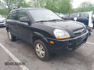 2009 Hyundai Tucson GLS with VIN KM8JM12B59U990027, listed as a IAAI auction lot 42195935 with 170,875 mi miles. Bid and sale history available at carsss.com. Image 1.