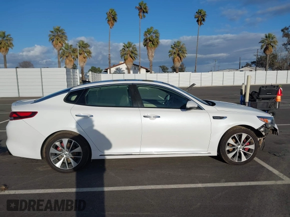 2016 Kia Optima SXL Turbo with VIN 5XXGV4L20GG023095, listed as a IAAI auction lot 41580598 with 155,002 mi miles. Bid and sale history available at carsss.com. Image 13.