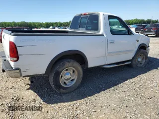 2001 Ford F-150 XL with VIN 1FTRF18L41NB60977, listed as a Copart auction lot 54933785 with 238,700 mi miles and Salvage title. Bid and sale history available at DreamBid. Image 3.