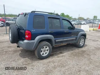 2002 Jeep Liberty Sport with VIN 1J4GL48K42W260513, listed as a IAAI auction lot 42163192 with 146,789 mi miles. Bid and sale history available at carsss.com. Image 4.