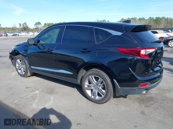 2021 Acura RDX w/Advance Package with VIN 5J8TC1H74ML011746, listed as a IAAI auction lot 41331679 with 72,676 mi miles. Bid and sale history available at carsss.com. Image 3.