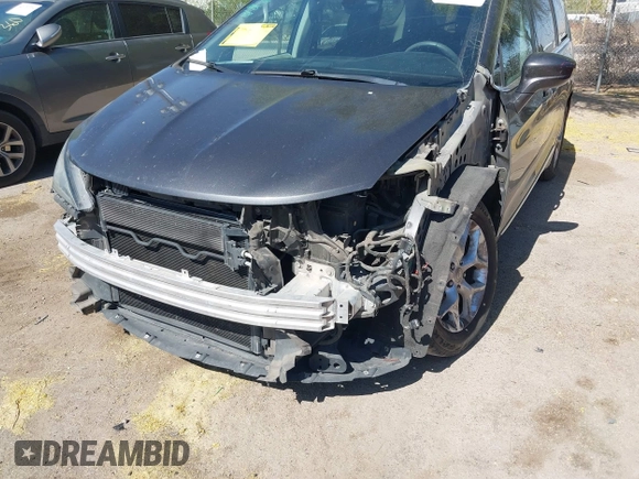 2017 Chrysler Pacifica Touring L with VIN 2C4RC1BG0HR826881, listed as a IAAI auction lot 42171240 with 214,188 mi miles and . Bid and sale history available at DreamBid. Image 6.