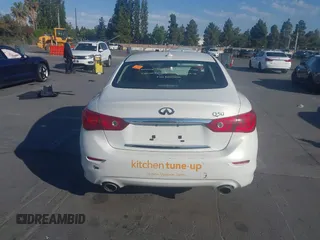 2014 Infiniti Q50 Premium with VIN JN1BV7AP8EM674009, listed as a IAAI auction lot 42598117 with 158,411 mi miles and . Bid and sale history available at DreamBid. Image 17.