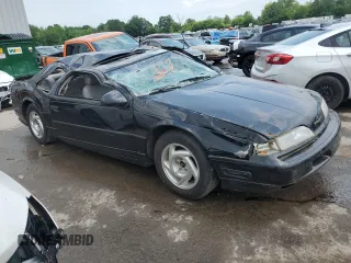 1989 Ford Thunderbird z VIN 1FAPP64R0KH161691, wystawiony jako Copart lot #60097275 z przebiegiem 70 041 mil mil oraz Szkoda całkowita • Salvage title. Historia ofert i sprzedaży dostępna na DreamBid. Obrazek 4.