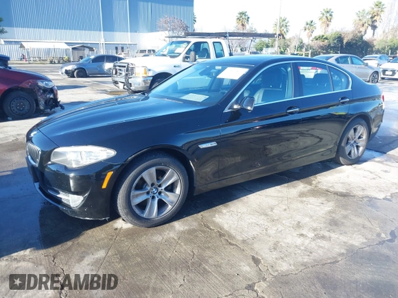 2011 BMW 5 Series 528i with VIN WBAFR1C54BC736807, listed as a IAAI auction lot 41511519 with 212,110 mi miles and . Bid and sale history available at carsss.com. Image 2.