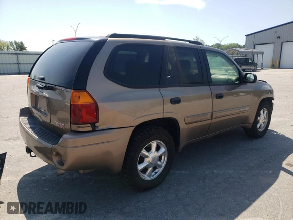 2003 GMC Envoy SLT с VIN 1GKDT13S132191047, выставлен на аукционе Copart как лот 53000825 с пробегом 180 050 миль миль и Списание • Salvage title. История ставок и продаж доступна на DreamBid. Изображение 3.