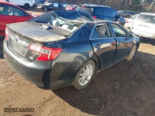2012 Toyota Camry Hybrid XLE with VIN 4T1BD1FK5CU061039, listed as a IAAI auction lot 41357985 with 76,493 mi miles. Bid and sale history available at carsss.com. Image 4.