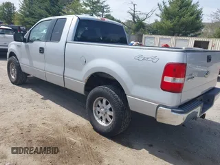 2005 Ford F-150 STX with VIN 1FTRX14W85NA00409, listed as a IAAI auction lot 42125903 with 160,230 mi miles and . Bid and sale history available at DreamBid. Image 3.