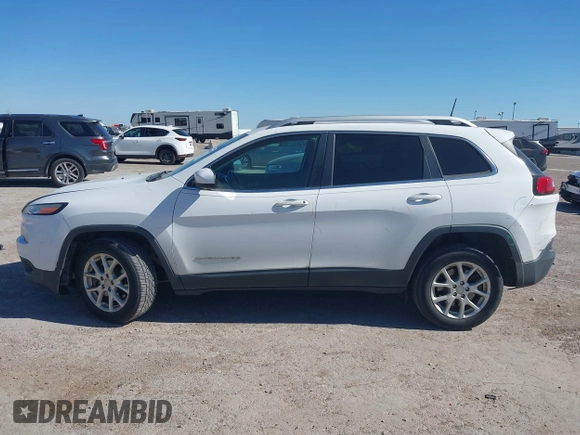 2016 Jeep Cherokee Latitude z VIN 1C4PJLCS0GW138381, wystawiony jako IAAI lot #41844589 z przebiegiem 100 991 mil mil oraz . Historia ofert i sprzedaży dostępna na DreamBid. Obrazek 14.