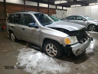2007 GMC Envoy SLE with VIN 1GKDT13S572301992, listed as a Copart auction lot 87404174 with 131,741 mi miles and Salvage Title. Bid and sale history available at carsss.com. Image 4.