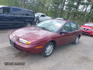 2001 Saturn SL z VIN 1G8ZH52841Z331770, wystawiony jako IAAI lot #42136194 z przebiegiem 70 798 mil mil oraz . Historia ofert i sprzedaży dostępna na DreamBid. Obrazek 2.