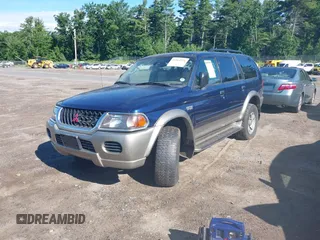 2001 Mitsubishi Montero Sport LS with VIN JA4MT31H81P039209, listed as a IAAI auction lot 41592089 with 174,416 mi miles. Bid and sale history available at carsss.com. Image 2.
