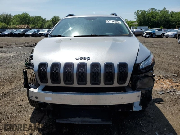 2016 Jeep Cherokee Altitude with VIN 1C4PJMCB2GW225883, listed as a Copart auction lot 55726885 with 142,802 mi miles and Salvage title. Bid and sale history available at DreamBid. Image 5.
