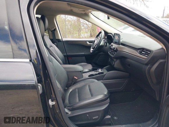 2020 Ford Escape Titanium Hybrid z VIN 1FMCU0DZ5LUB39205, wystawiony jako IAAI lot #42192828 z przebiegiem 47 878 mil mil oraz . Historia ofert i sprzedaży dostępna na DreamBid. Obrazek 5.