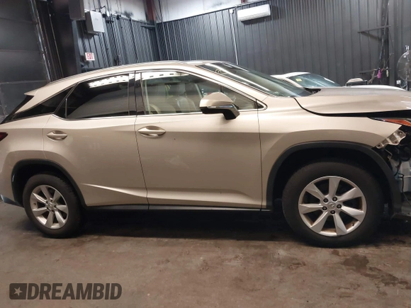 2017 Lexus RX 350 z VIN 2T2BZMCAXHC064652, wystawiony jako IAAI lot #42524586 z przebiegiem 70 702 mil mil oraz . Historia ofert i sprzedaży dostępna na DreamBid. Obrazek 13.