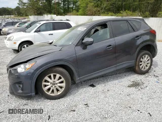 2015 Mazda CX-5 Touring with VIN JM3KE2CYXF0525607, listed as a Copart auction lot 51949355 with 0 mi miles and Clean Title. Bid and sale history available at carsss.com. Image 1.