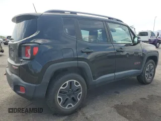2015 Jeep Renegade Trailhawk z VIN ZACCJBCT1FPC41628, wystawiony jako Copart lot #59054825 z przebiegiem 138 053 mil mil oraz Szkoda całkowita • Salvage title. Historia ofert i sprzedaży dostępna na DreamBid. Obrazek 3.
