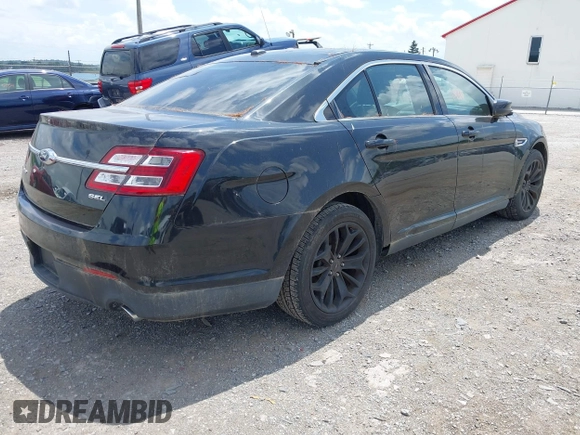 2015 Ford Taurus SEL z VIN 1FAHP2E88FG136181, wystawiony jako IAAI lot #42681490 z przebiegiem 230 000 mil mil oraz . Historia ofert i sprzedaży dostępna na DreamBid. Obrazek 4.