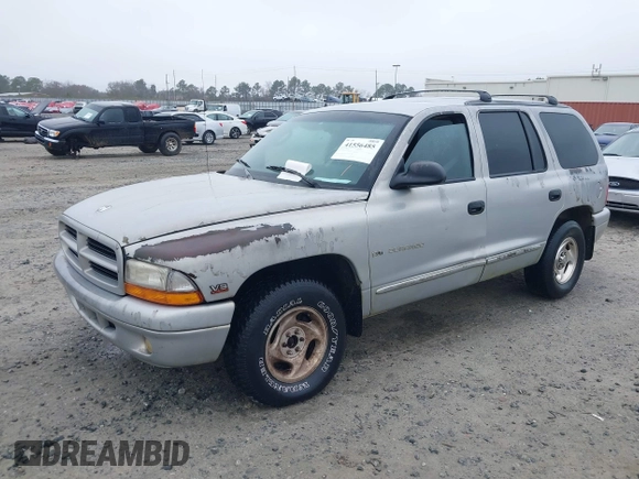 1999 Dodge Durango with VIN 1B4HR28YXXF517034, listed as a IAAI auction lot 41556485 with 208,998 mi miles and . Bid and sale history available at DreamBid. Image 2.