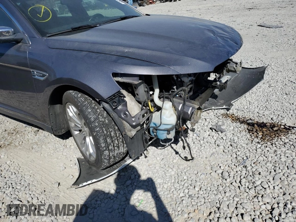 2013 Ford Taurus Limited z VIN 1FAHP2F83DG221702, wystawiony jako Copart lot #51580255 z przebiegiem 174 364 mil mil oraz Szkoda całkowita • Salvage title. Historia ofert i sprzedaży dostępna na DreamBid. Obrazek 9.