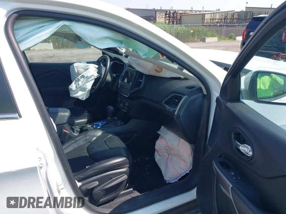 2019 Jeep Cherokee Latitude Plus with VIN 1C4PJMLN8KD167776, listed as a IAAI auction lot 42730399 with 59,548 mi miles and . Bid and sale history available at DreamBid. Image 5.