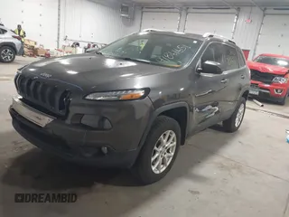 2014 Jeep Cherokee Altitude with VIN 1C4PJMCB2EW317346, listed as a IAAI auction lot 41861651 with 100,602 mi miles. Bid and sale history available at carsss.com. Image 17.