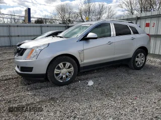 2013 Cadillac SRX Luxury Collection with VIN 3GYFNCE3XDS572279, listed as a Copart auction lot 50566185 with 124,850 mi miles and Salvage Title. Bid and sale history available at carsss.com. Image 1.