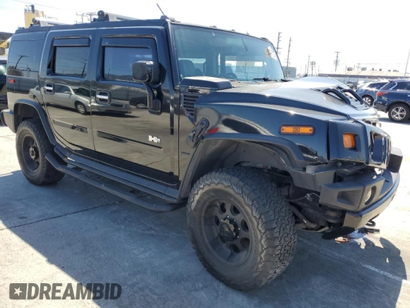 2003 Hummer H2 with VIN 5GRGN23U73H122529, listed as a Copart auction lot 50157934 with 0 mi miles and Salvage Title. Bid and sale history available at carsss.com. Image 4.