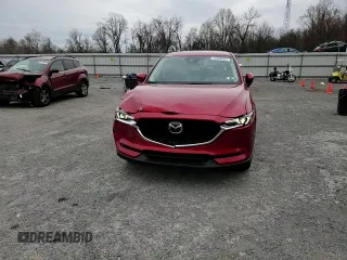 2021 Mazda CX-5 Grand Touring Reserve with VIN JM3KFBAY3M0315640, listed as a Copart auction lot 51004955 with 21,981 mi miles and Salvage Title. Bid and sale history available at DreamBid. Image 12.
