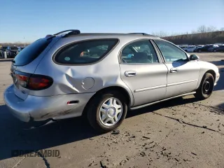 1999 Ford Taurus SE with VIN 1FAFP58U5XG240517, listed as a Copart auction lot 83514044 with 101,092 mi miles and Clean title. Bid and sale history available at DreamBid. Image 3.