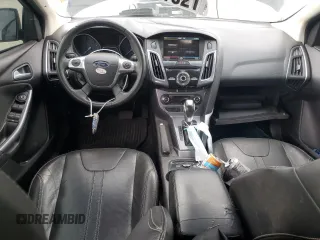 2014 Ford Focus Titanium with VIN 1FADP3J22EL221898, listed as a Copart auction lot 47867325 with 97,806 mi miles and Salvage Title. Bid and sale history available at DreamBid. Image 8.