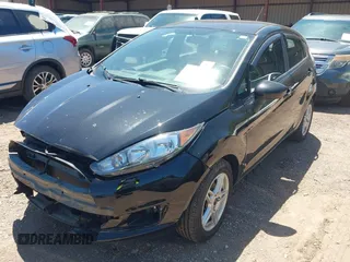 2019 Ford Fiesta SE z VIN 3FADP4EJ0KM125724, wystawiony jako IAAI lot #42320657 z przebiegiem 53 728 mil mil oraz . Historia ofert i sprzedaży dostępna na DreamBid. Obrazek 19.