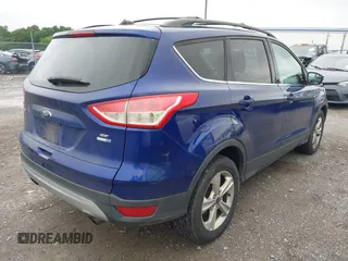 2013 Ford Escape SE with VIN 1FMCU9GX1DUD83174, listed as a IAAI auction lot 42509186 with 164,584 mi miles and . Bid and sale history available at DreamBid. Image 4.