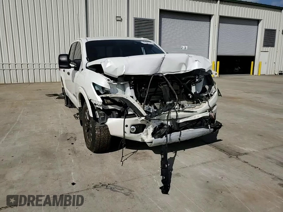 2019 Nissan Titan Pro-4X z VIN 1N6AA1E51KN526104, wystawiony jako Copart lot #51694335 z przebiegiem 56 620 mil mil oraz Szkoda całkowita • Salvage title. Historia ofert i sprzedaży dostępna na DreamBid. Obrazek 11.