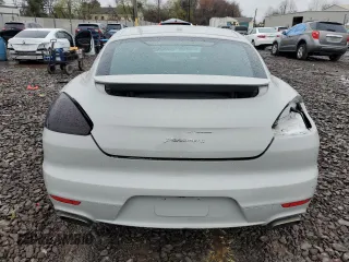2015 Porsche Panamera 4 z VIN WP0AA2A72FL000789, wystawiony jako Copart lot #51923145 z przebiegiem 138 411 mil mil oraz Szkoda całkowita • Salvage title. Historia ofert i sprzedaży dostępna na DreamBid. Obrazek 6.