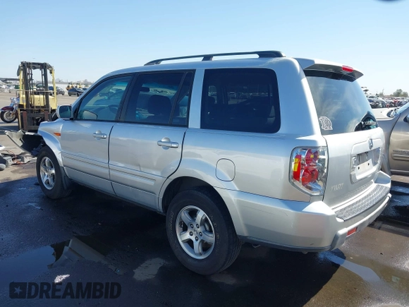 2006 Honda Pilot EX with VIN 5FNYF28436B028888, listed as a IAAI auction lot 42014594 with 219,180 mi miles and . Bid and sale history available at DreamBid. Image 3.